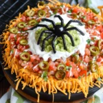 7 Layer Halloween Taco Dip (with Edible Spider and Spiderweb!)